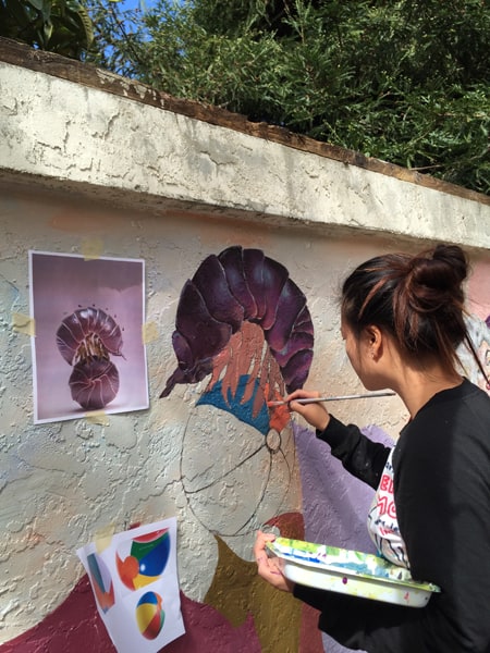 Student Muralists Go 'Through the Looking Glass'